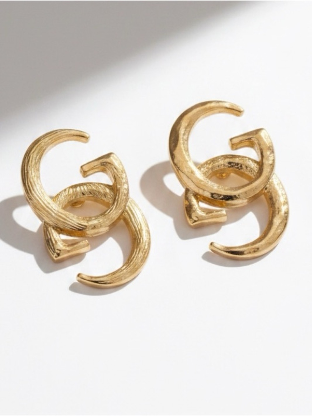 Metallic Gold Tone GG Logo Stud Earrings